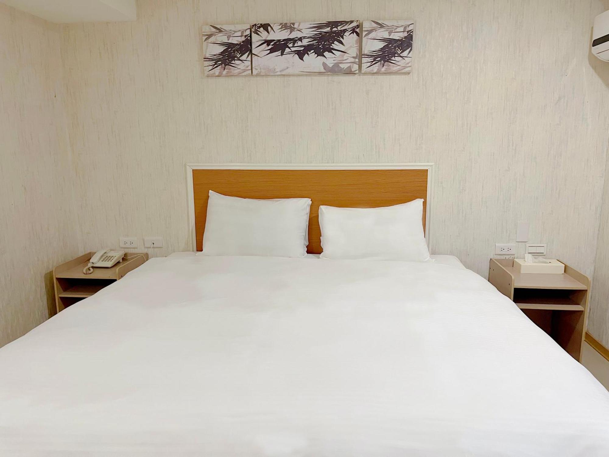 E Lim Hotel Чжунли Номер фото