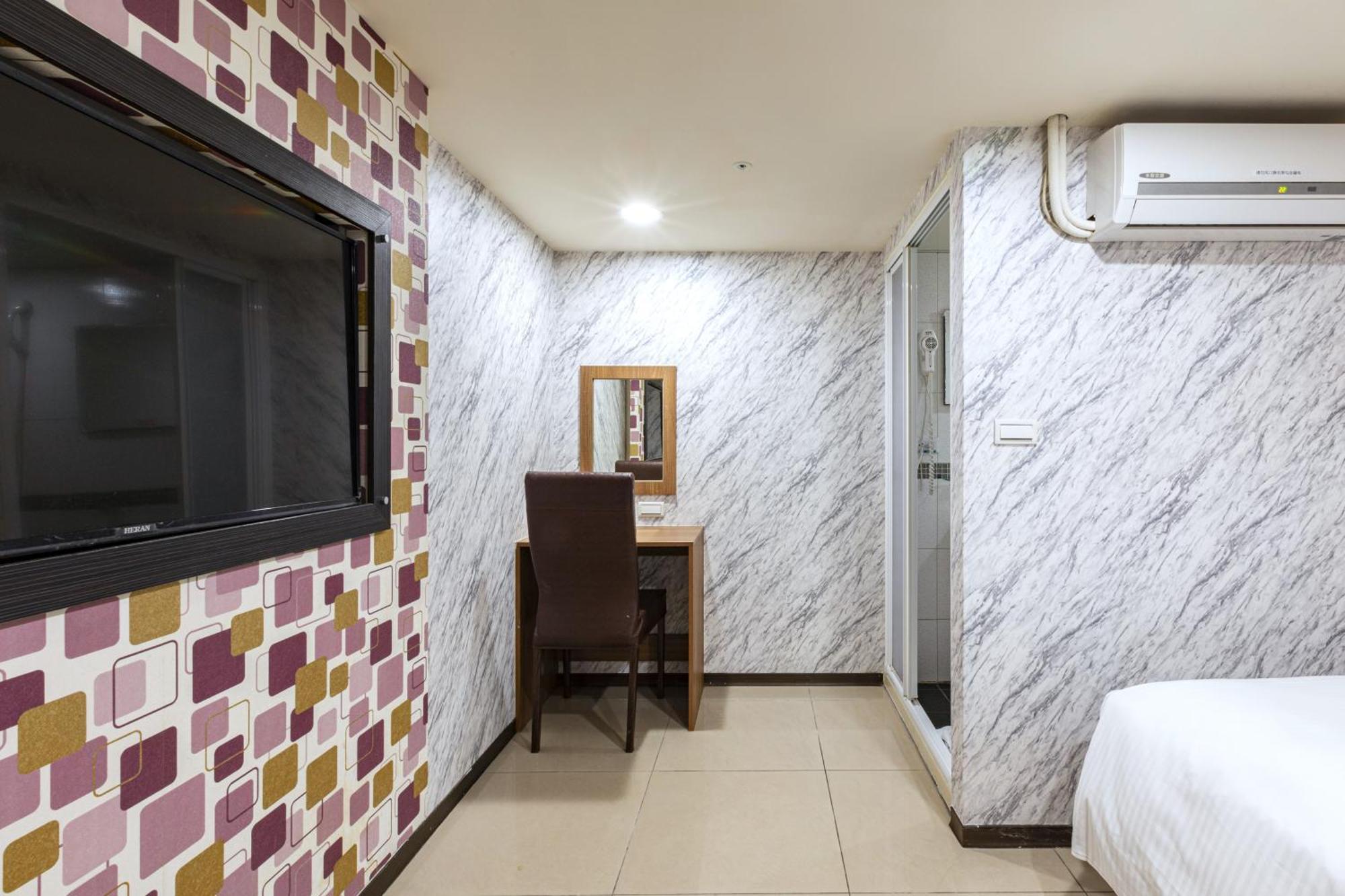 E Lim Hotel Чжунли Номер фото
