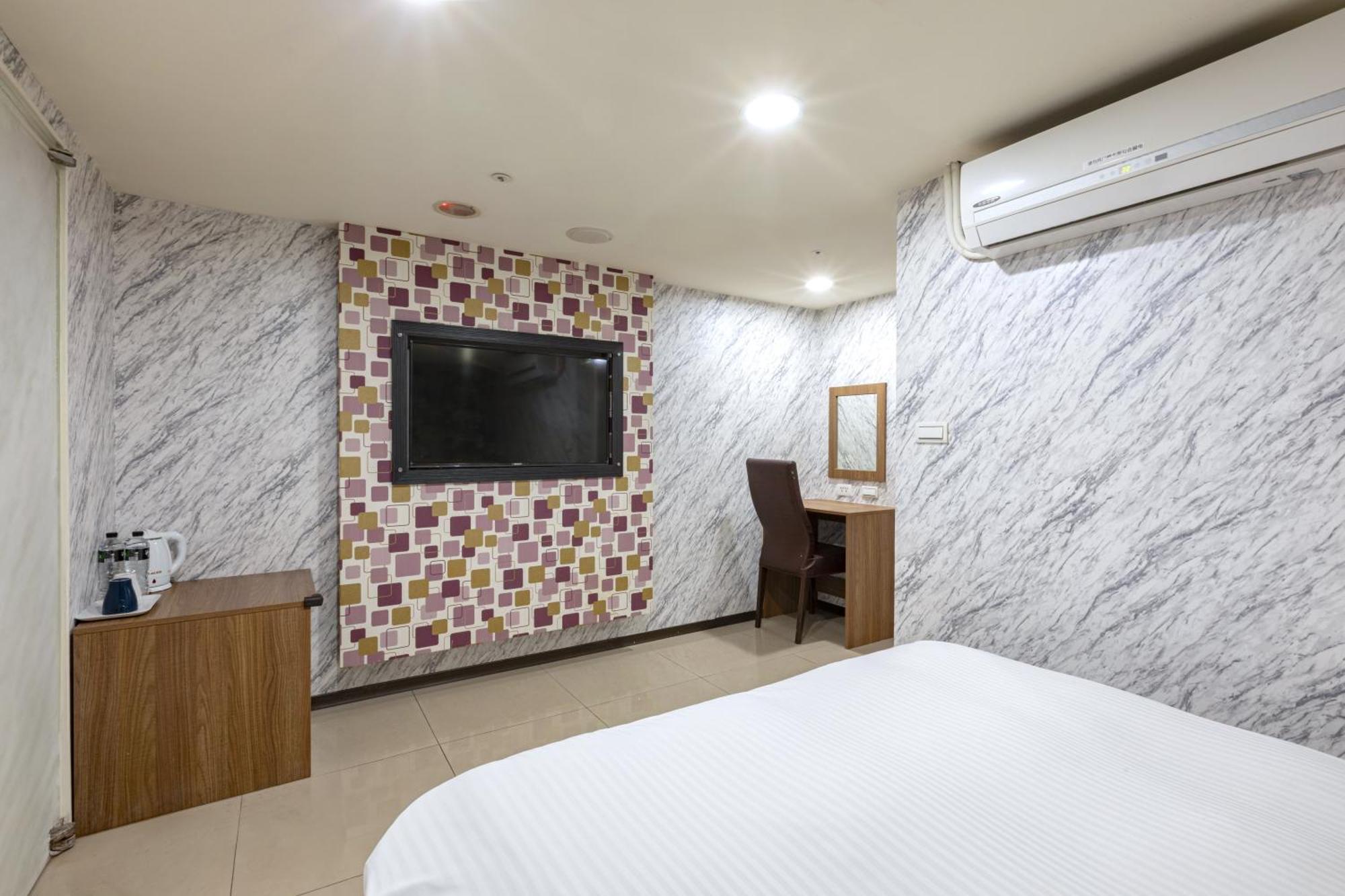 E Lim Hotel Чжунли Номер фото