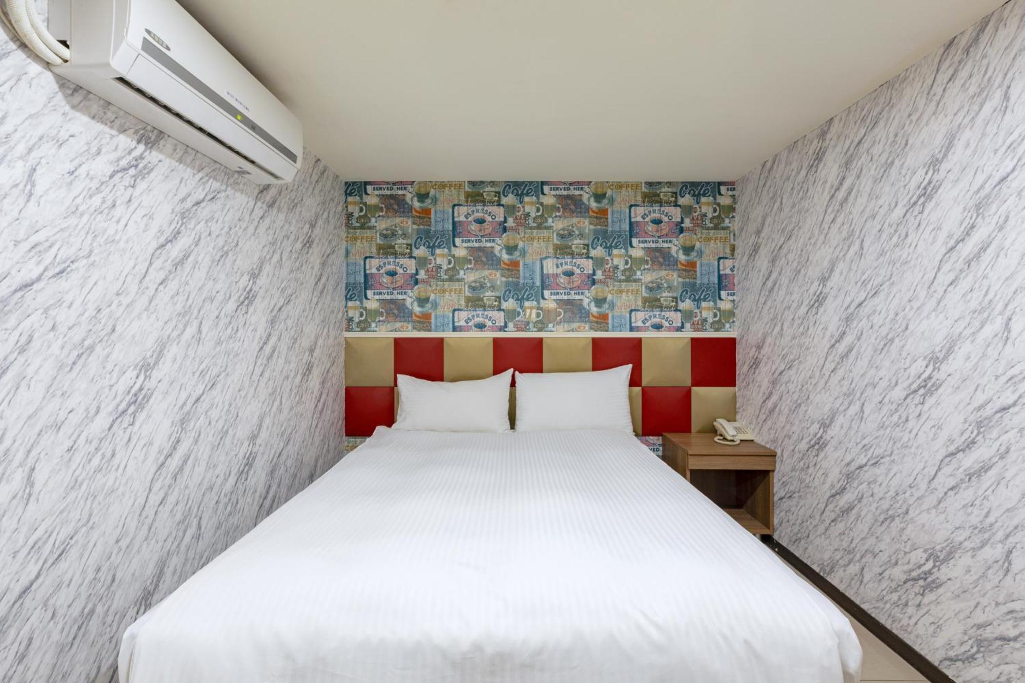 E Lim Hotel Чжунли Номер фото